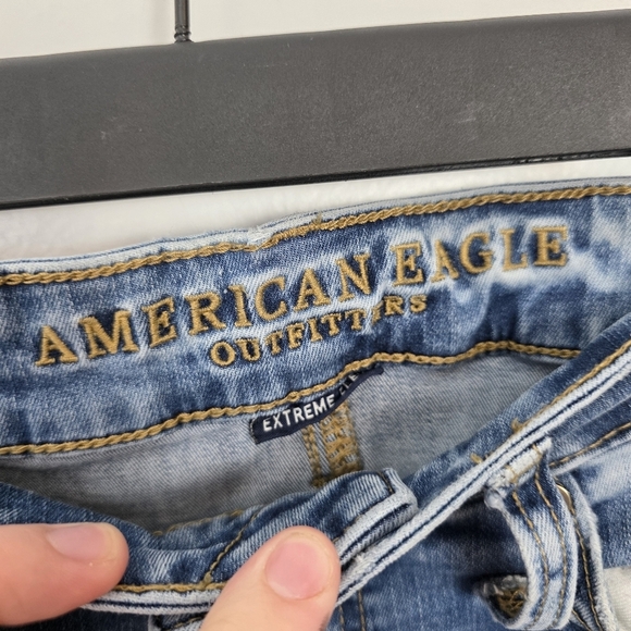 American Eagle Medihm Wash Distressed Low Rise Stretchy Skinny Jeans Size 30×34 - Picture 3 of 6